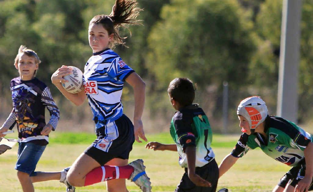 One Springsure player finds a hole in Emerald’s defence. Photo: Terry Hill One Springsure player finds a hole in Emerald’s defence. Photo: Terry Hill
